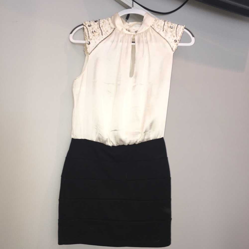 White and black work dress with beaded neckline